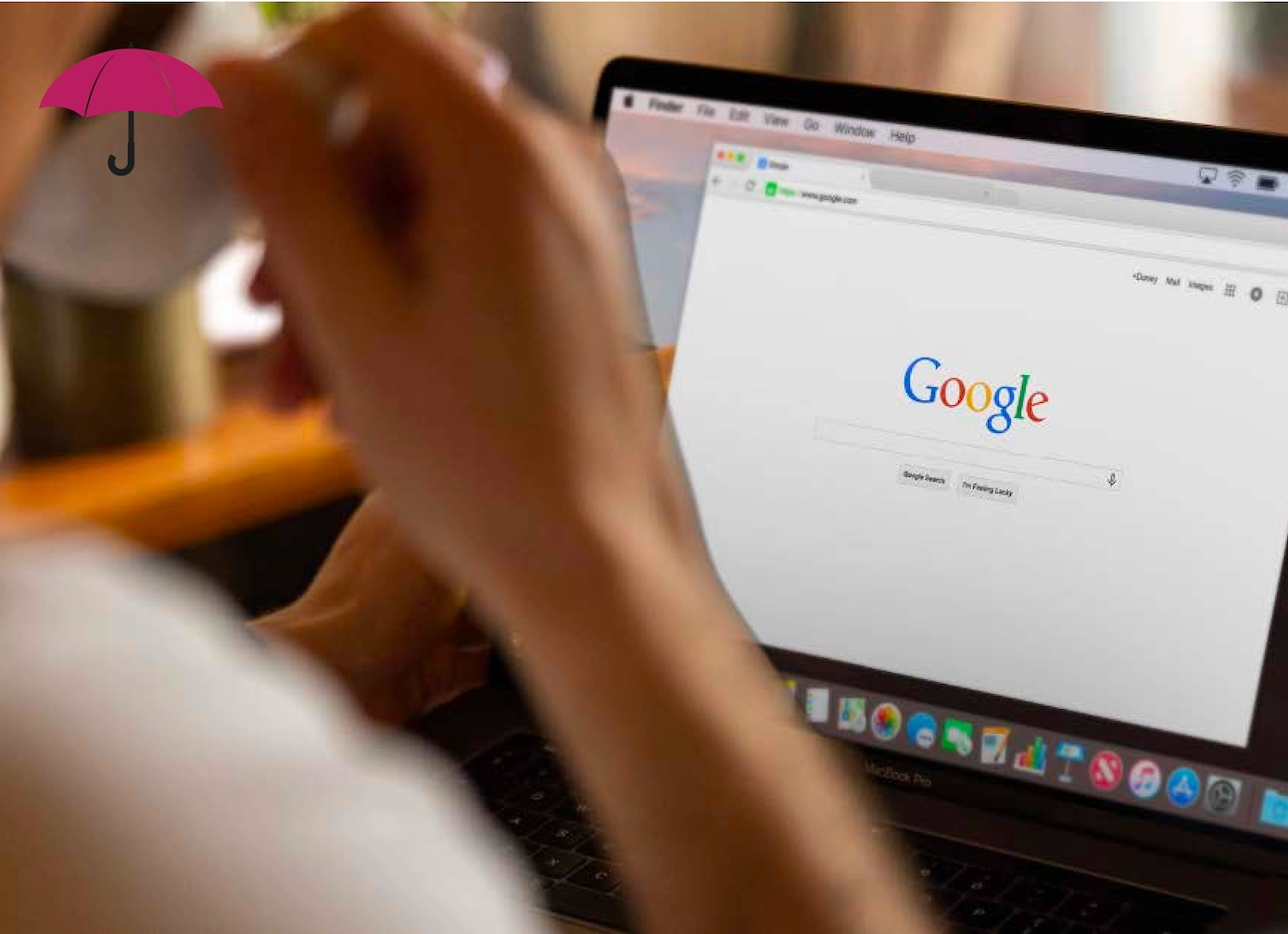 person sipping coffee while searching on Google