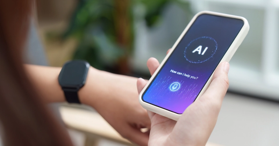 Person holding smartphone and utilizing an AI platform to gain information